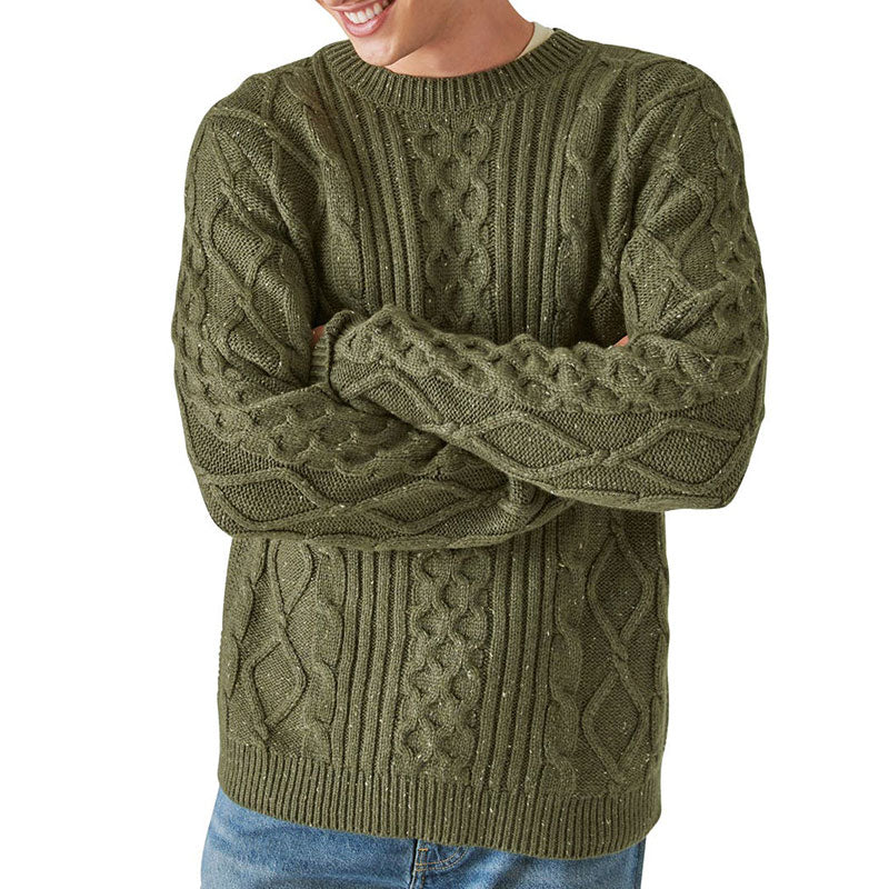 Man wearing an olive green wool blend cable knit pullover sweater, showcasing the front view. The sweater features intricate cable knit patterns and a round neck.