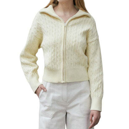 Woman wearing a custom wool blend zipper cardigan with cable-knit patterns, front view, showcasing the full front zipper and elegant design.